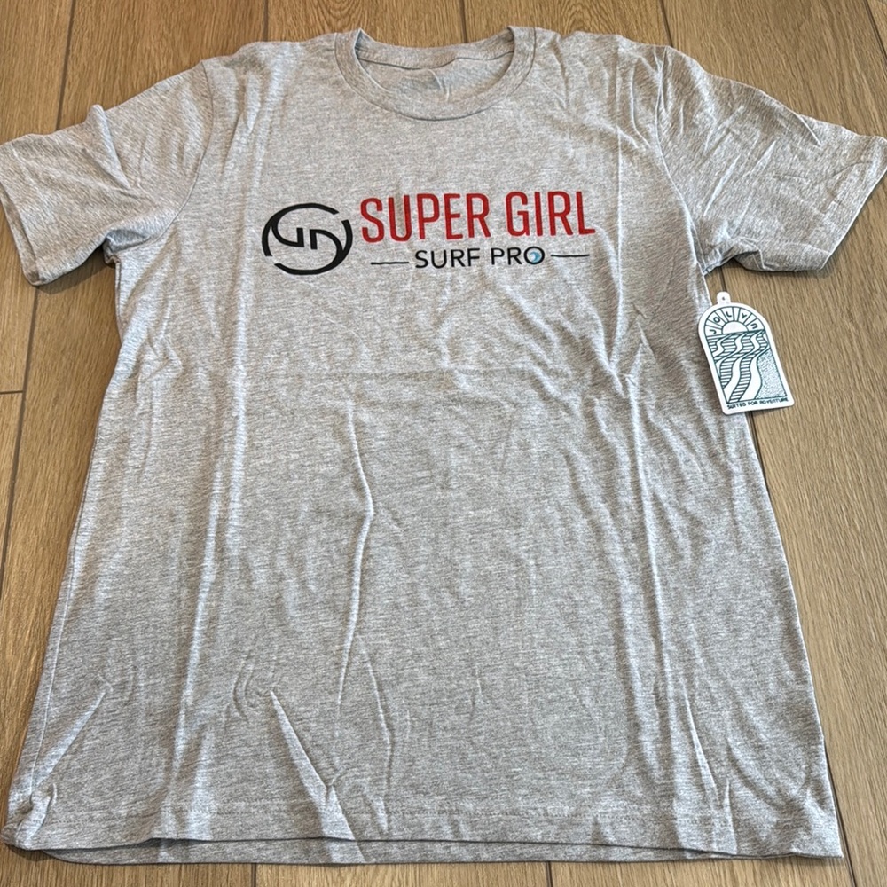 NWT Jolyn Super Girl Surf Pro Volunteer Shirt Size Medium
